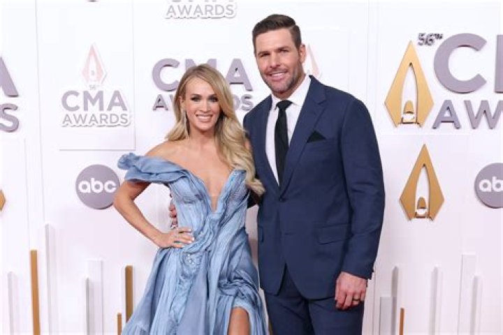 Carrie Underwood husband body age height son is she divorced?
