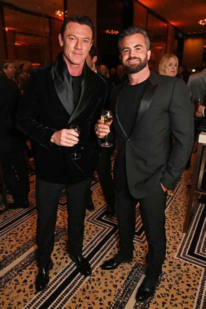 Luke Evans and Boyfriend Fran Tomas Hit the Miami Shore in Speedos After Red Carpet Debut as Couple