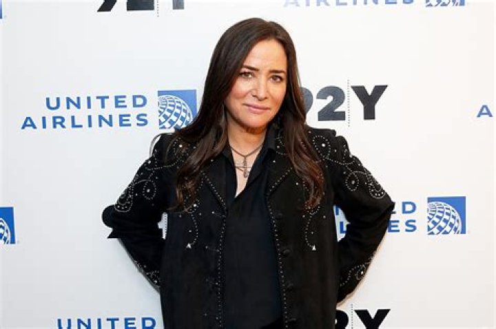 Pamela Adlon: Single, net worth, tattoos, smoking & body measurements