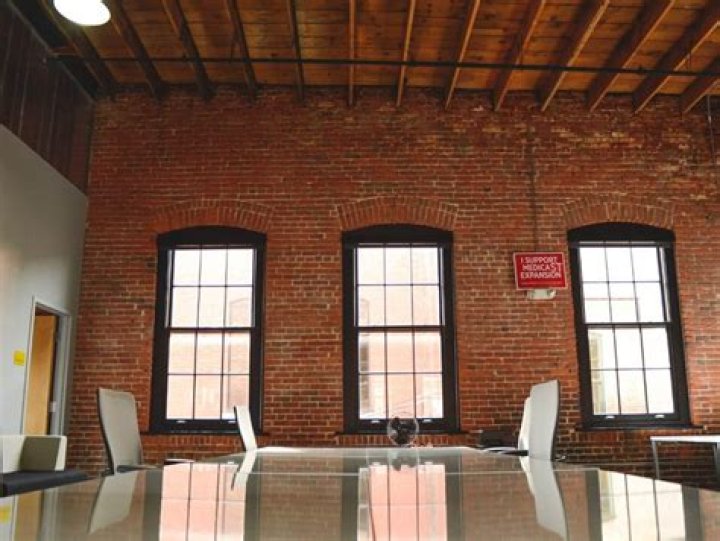 What is more dense wood or brick